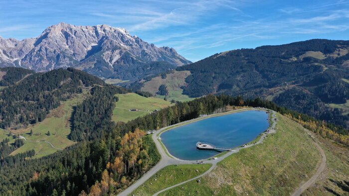 Lake Prinzensee at Natrun is photographed from above with a drone. In the background you can see the Hochkönig massif. | © Hochkönig