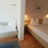 Photo of 4-bed room, shower, toilet