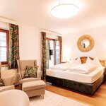 Photo of Suite, shower or bath, toilet, living room/bedroom