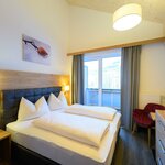 Photo of Family room, shower, toilet, 2 bed rooms